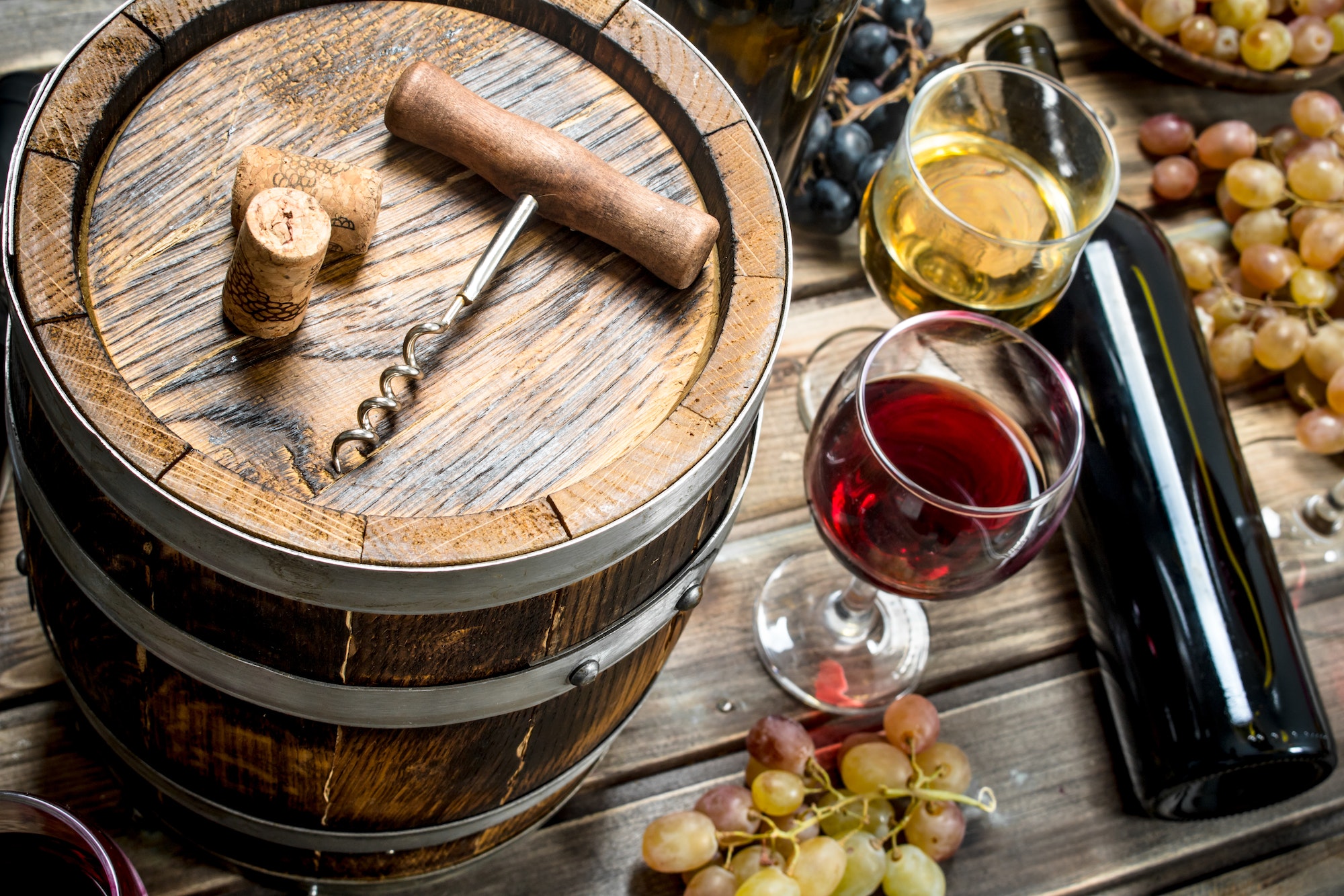 Wine background. White and red wine in glasses.